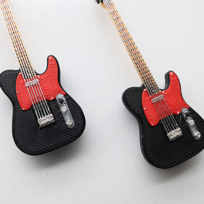 1:12スケールのエレクトリックギターの楽器模型。樹脂製で、 - Musical Instrument Photo のレビューと価格